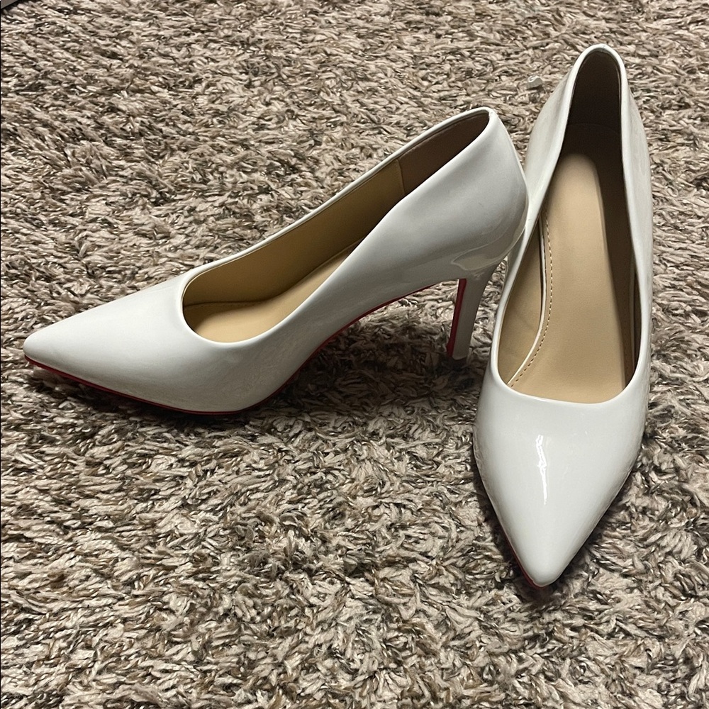 Classic Women's White Pointed-Toe Pumps with Red Bottoms